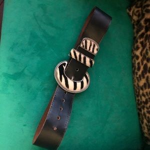 Black leather belt. End to end 35”, first hole 25”